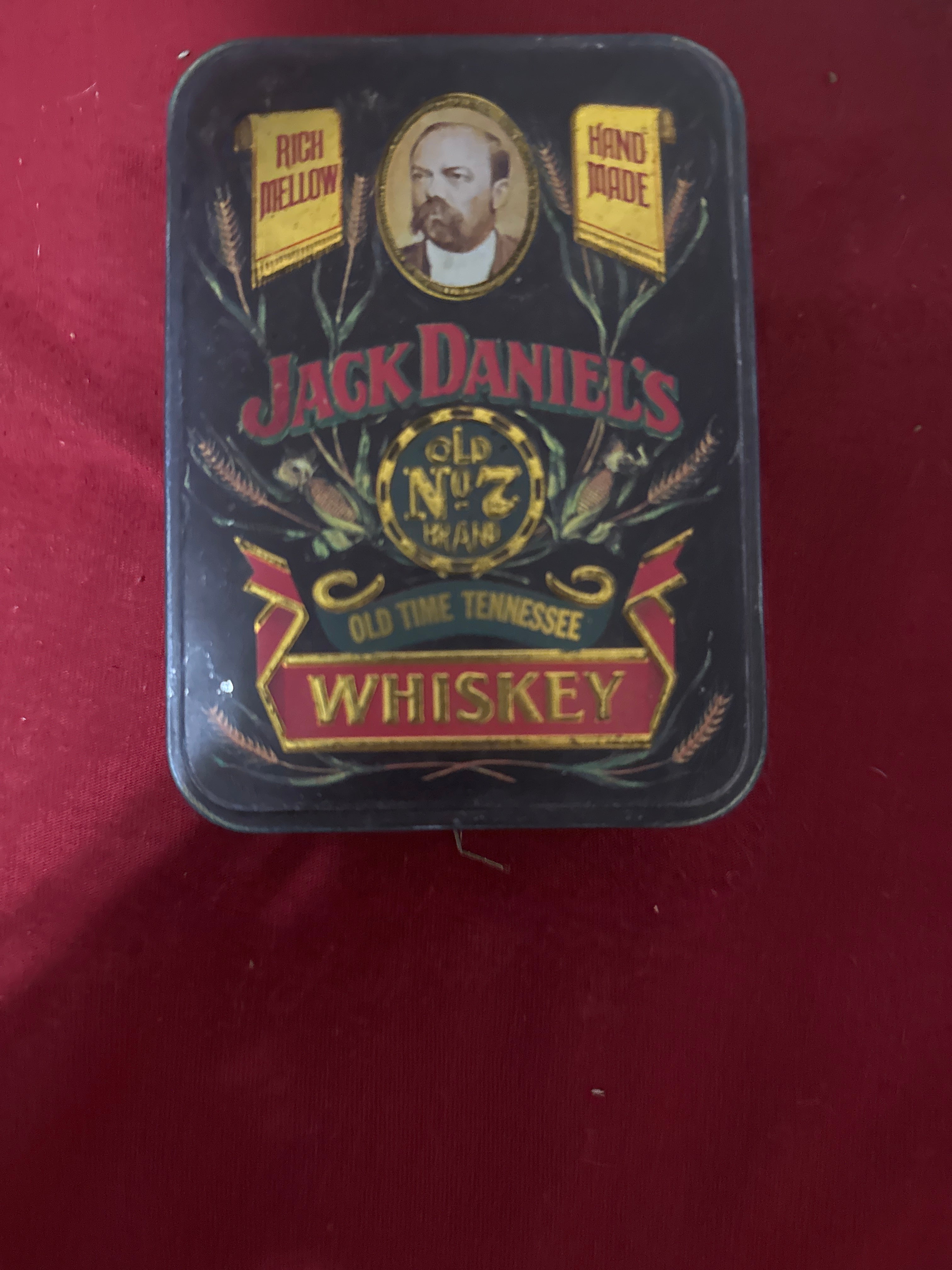 Jack Daniels tin with 2 mini Jack Daniel’s bottles